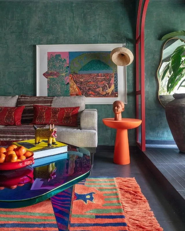 Colourful living room with teal walls